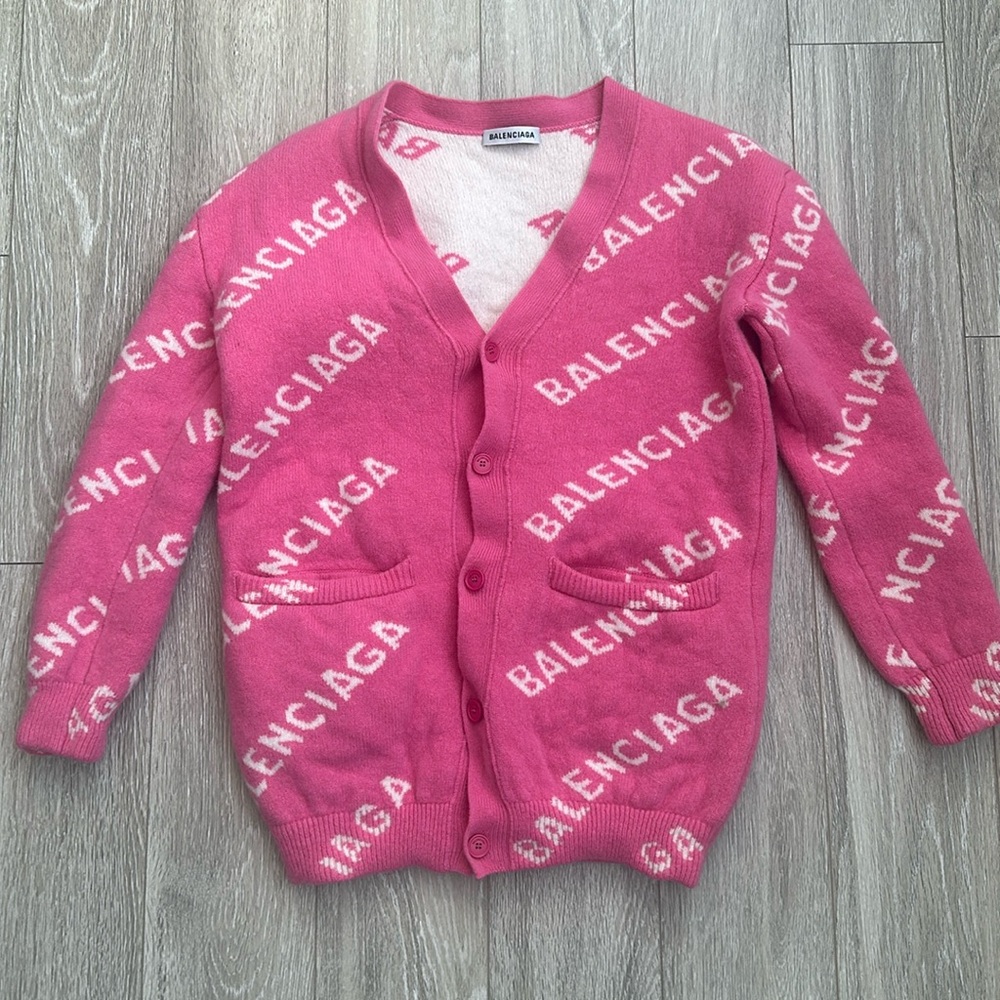 Balenciaga pink cardigan worn lightly